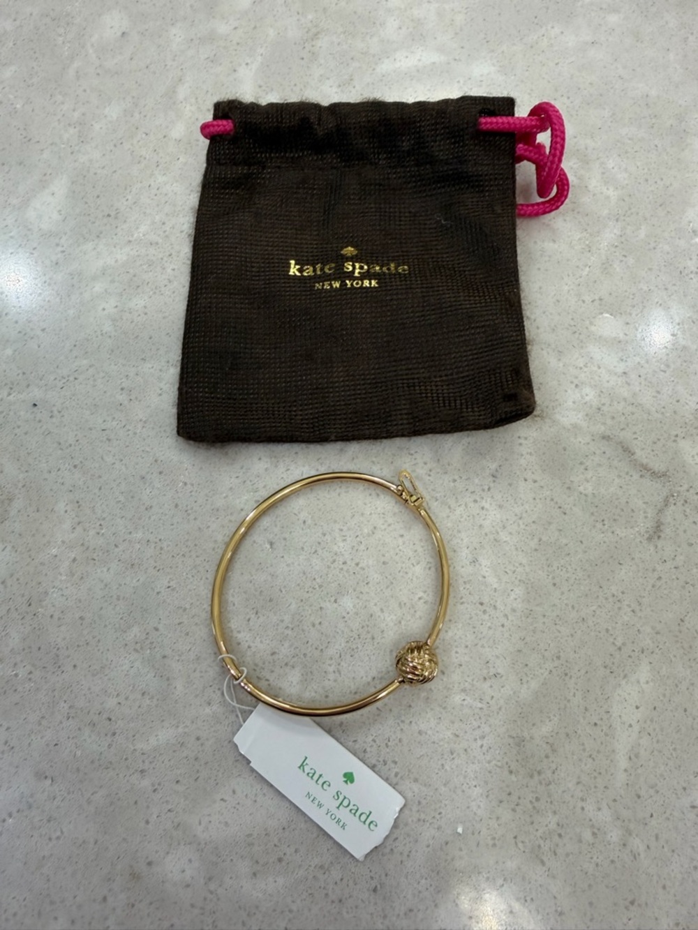 kate spade Gold Tone Knot Bangle Bracelet